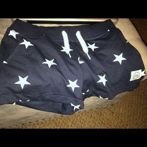 navy blue shorts, white stars
